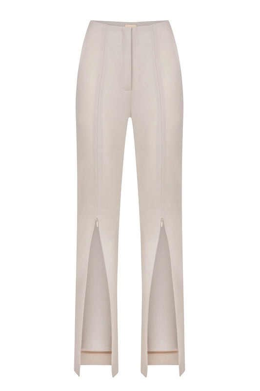 Beige slim fit pants with zipper on the front